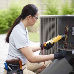 Dominion Service Co technician performing an ac tuneup