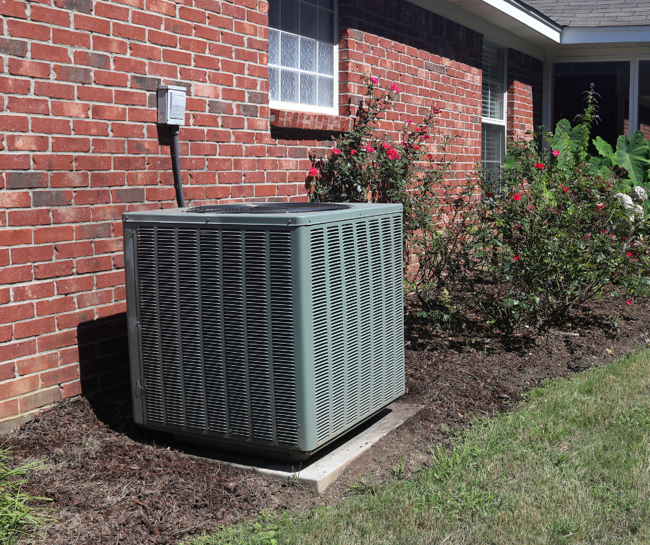 An HVAC unit outside of a home 